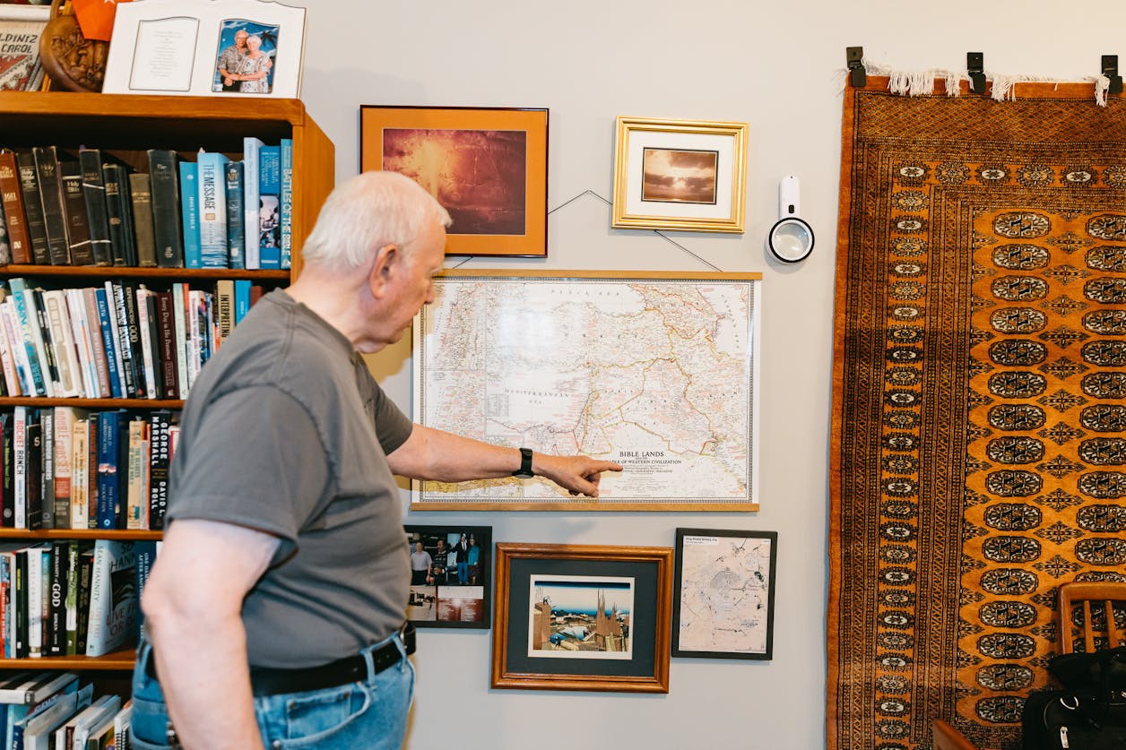Curtis pointing at map