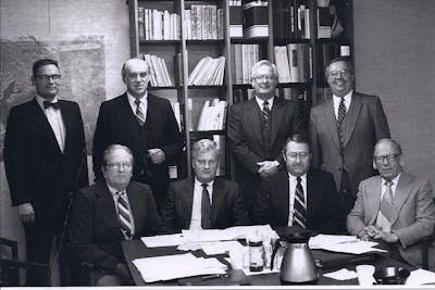 Don Benson (center) poses with the rest of the Bethel Foundation Board of Governors and past Bethel President George Brushaber (standing, far right) in the board's early days. 