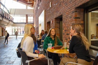 girls drinking coffee together