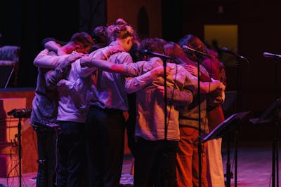 Students praying at Vespers