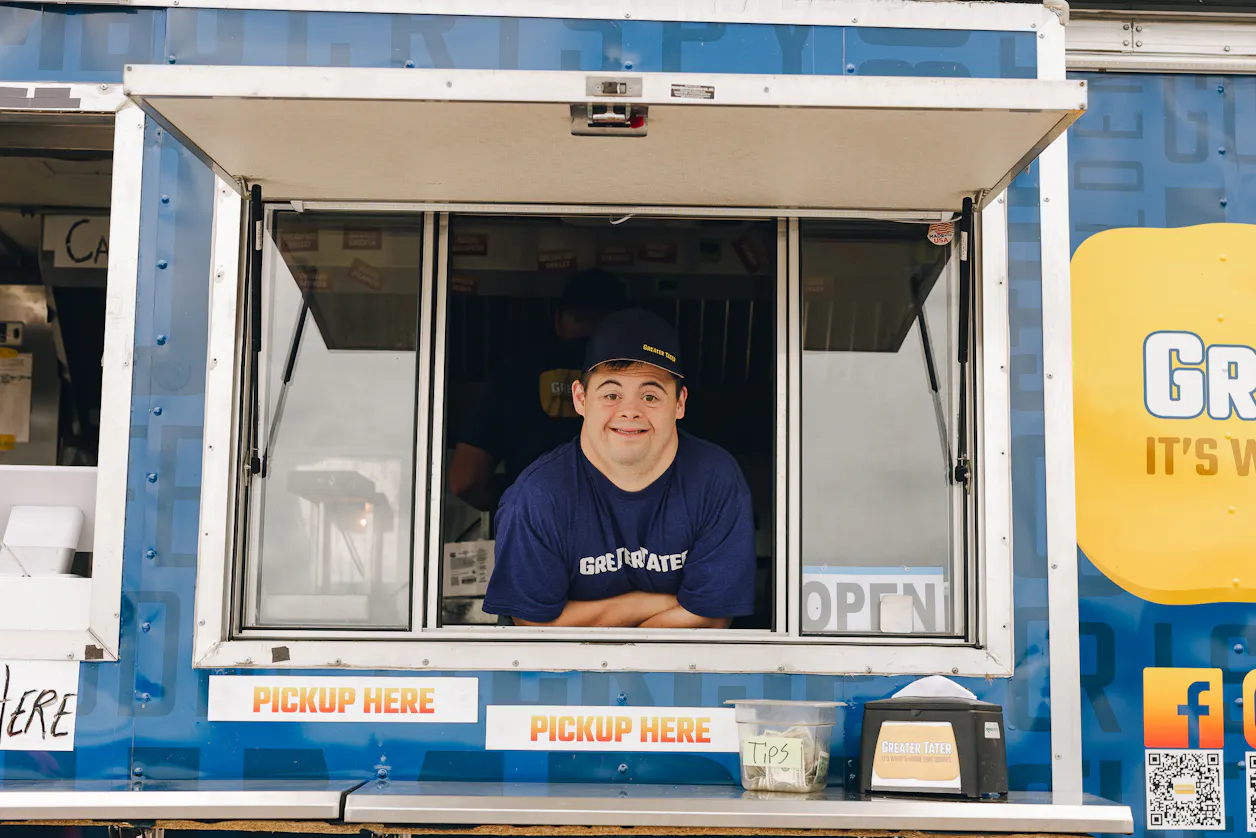 David smiling out the food truck window