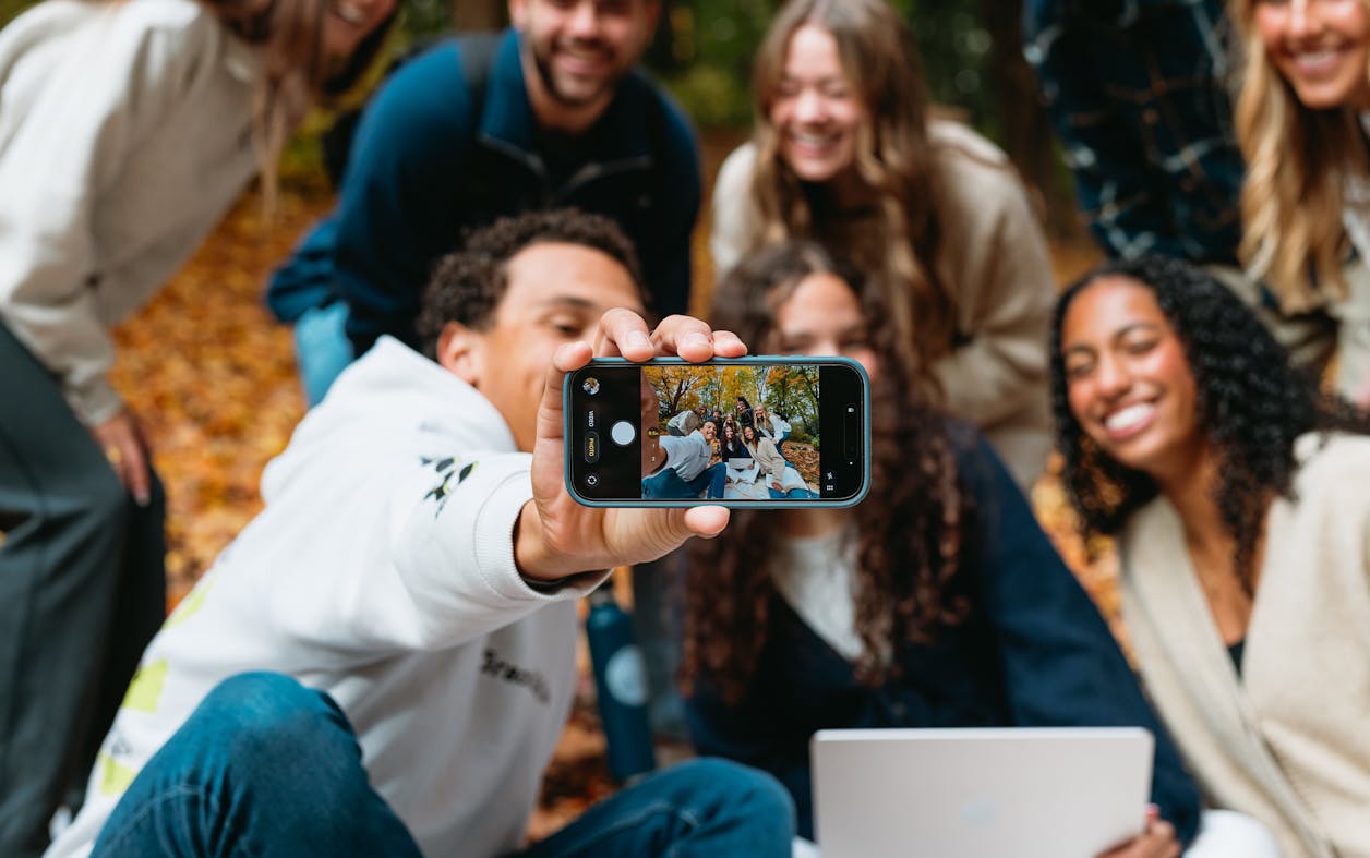 Students take a group selfie on Sem Hill