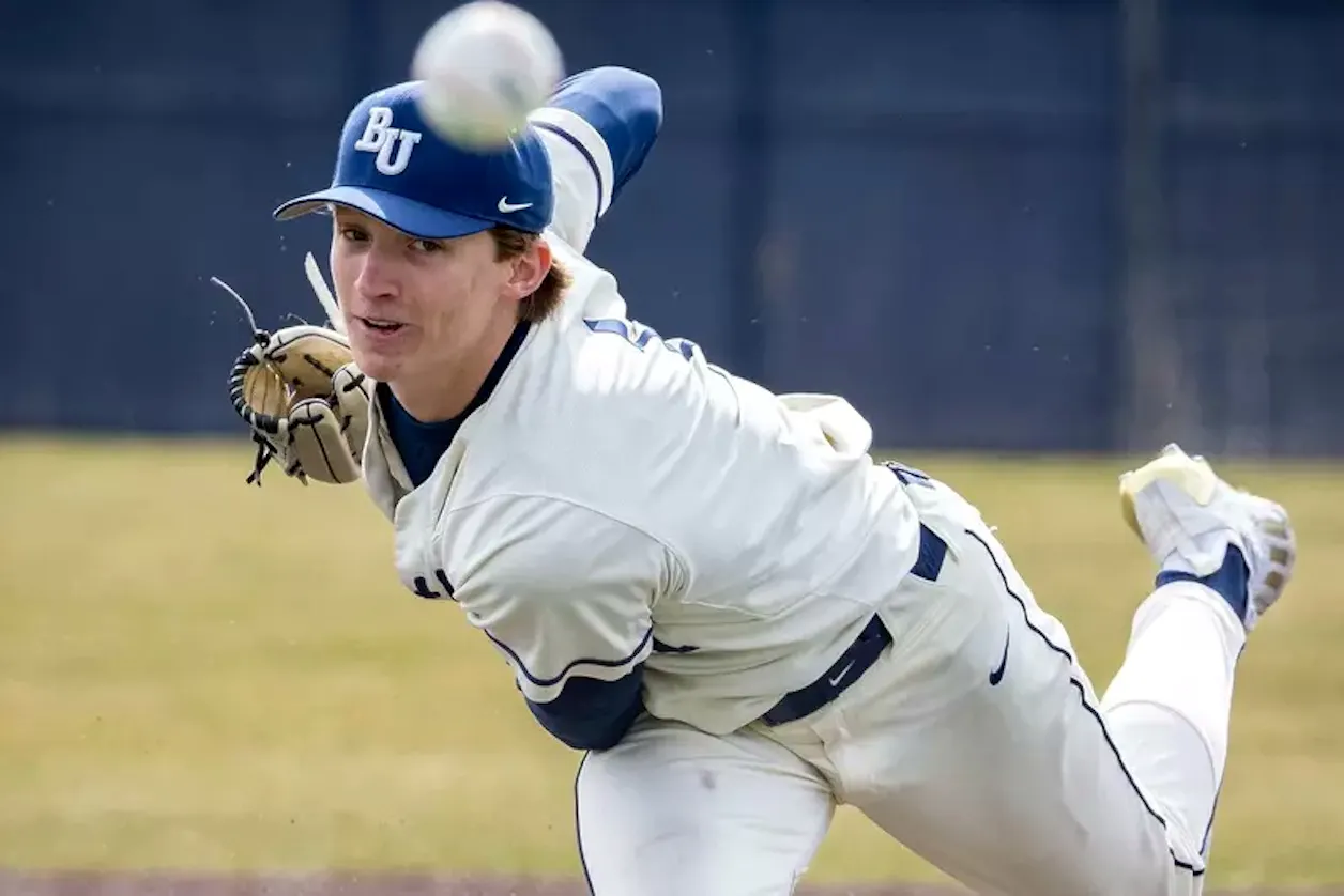 Bethel baseball pitcher delivers a pitch during a game.