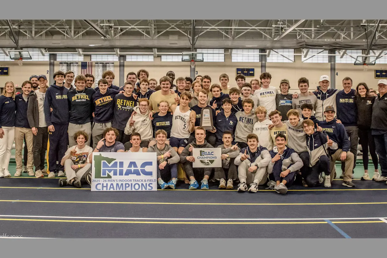 Bethel team celebrates MIAC indoor championship with trophy