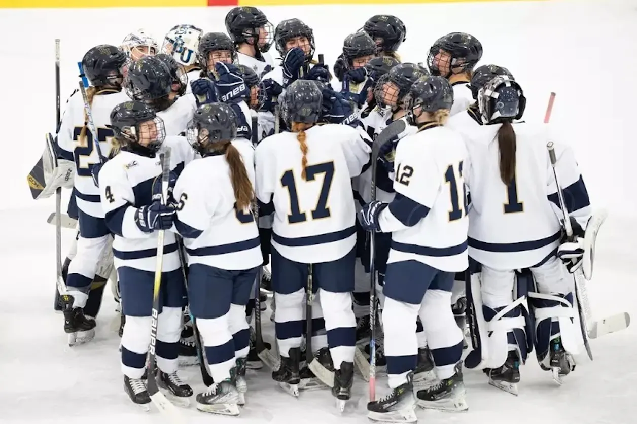 Women’s hockey: Bethel team gathers in tight huddle on ice