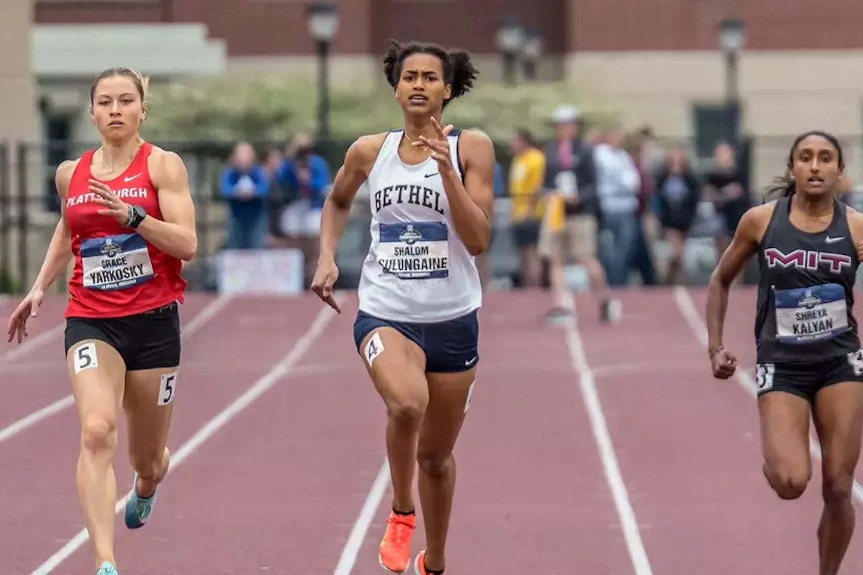 Bethel runner Shalom Sulungaine leads competitors down the track during a sprint race.