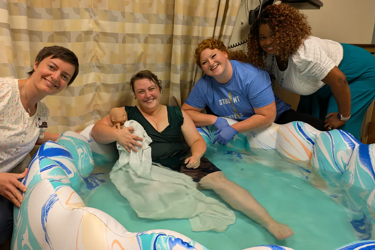 Nurse-midwifery students participate in a variety of birth simulations designed to expose them to different birth settings and help them learn to navigate complications that may arise.