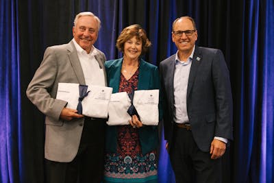 Bethel President Ross Allen thanked and prayed over donors Barb GS'01 and Rollie Anderson, who were presented with the first official Anderson Family College of Health Sciences medical coats. 