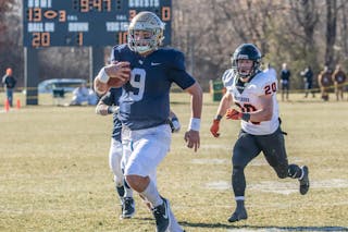 Quarterback Jaran Roste ’20 rushes the ball in the Bethel football team’s 41-14 win over Wartburg on Saturday. Roste ran the ball 10 times for 150 yards as the Royals racked up 387 rushing yards.