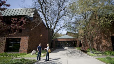 Students chatting outside the Seminary building.