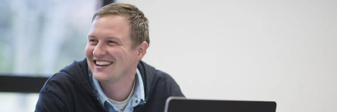 Seminary student smiling in class
