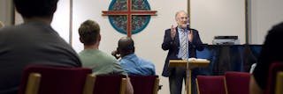 Speaking to a group at Chapel