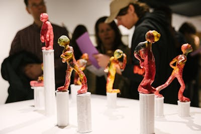 Colorful sculptures displayed in an art exhibition. 