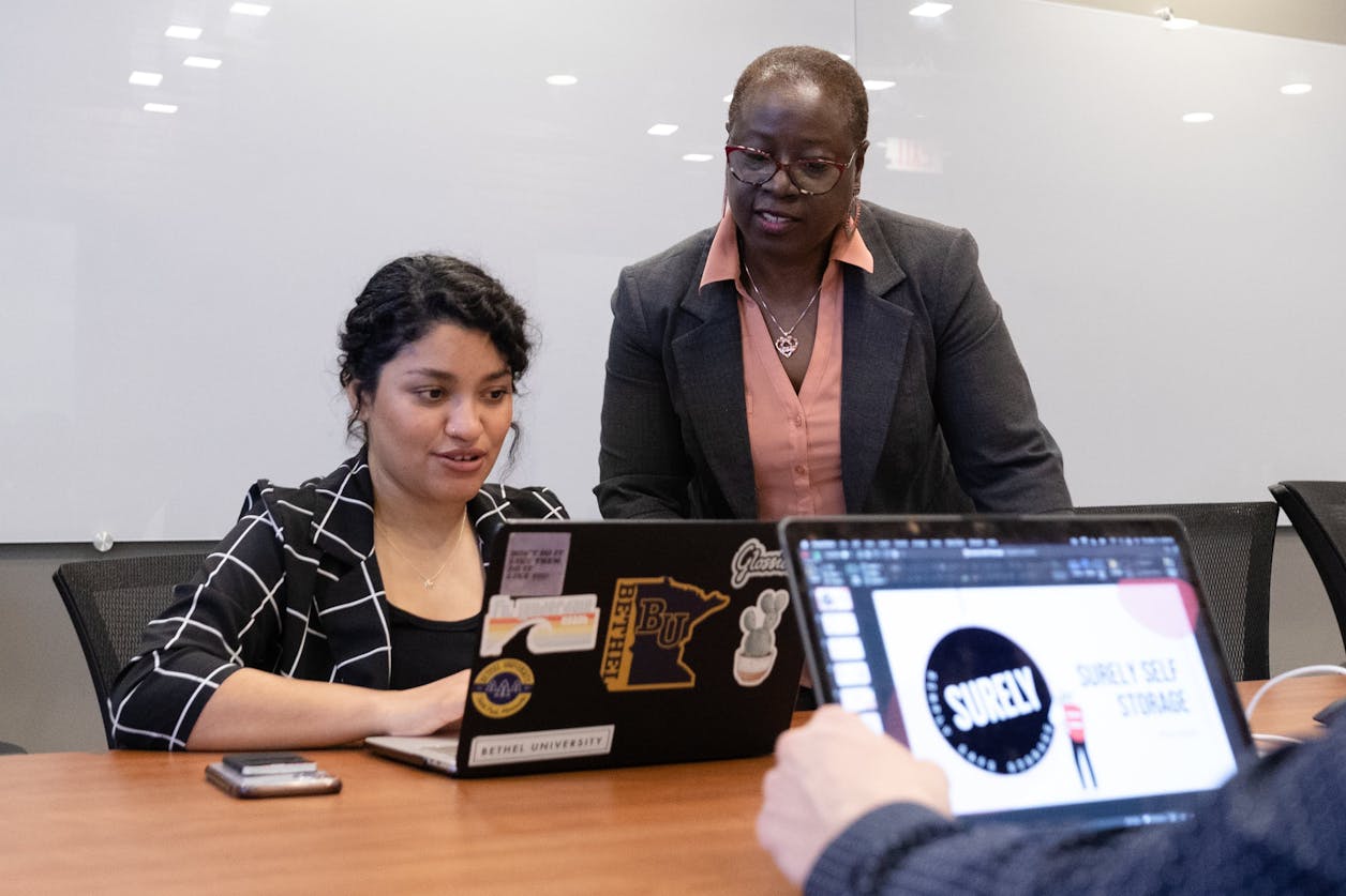 Bethel professor helping a student.