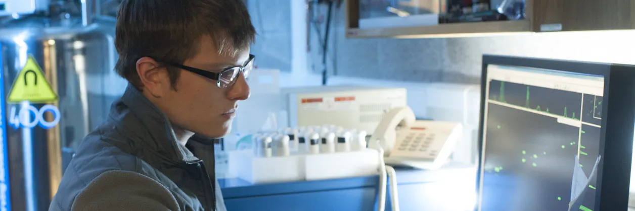 Physics student working in the lab