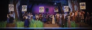 Students on-stage during a theatre production at Bethel University