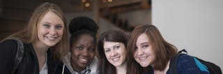 Group of students smiling into the camera