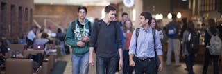 Students walking and chatting in the student commons