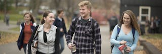 Students chatting and walking outside