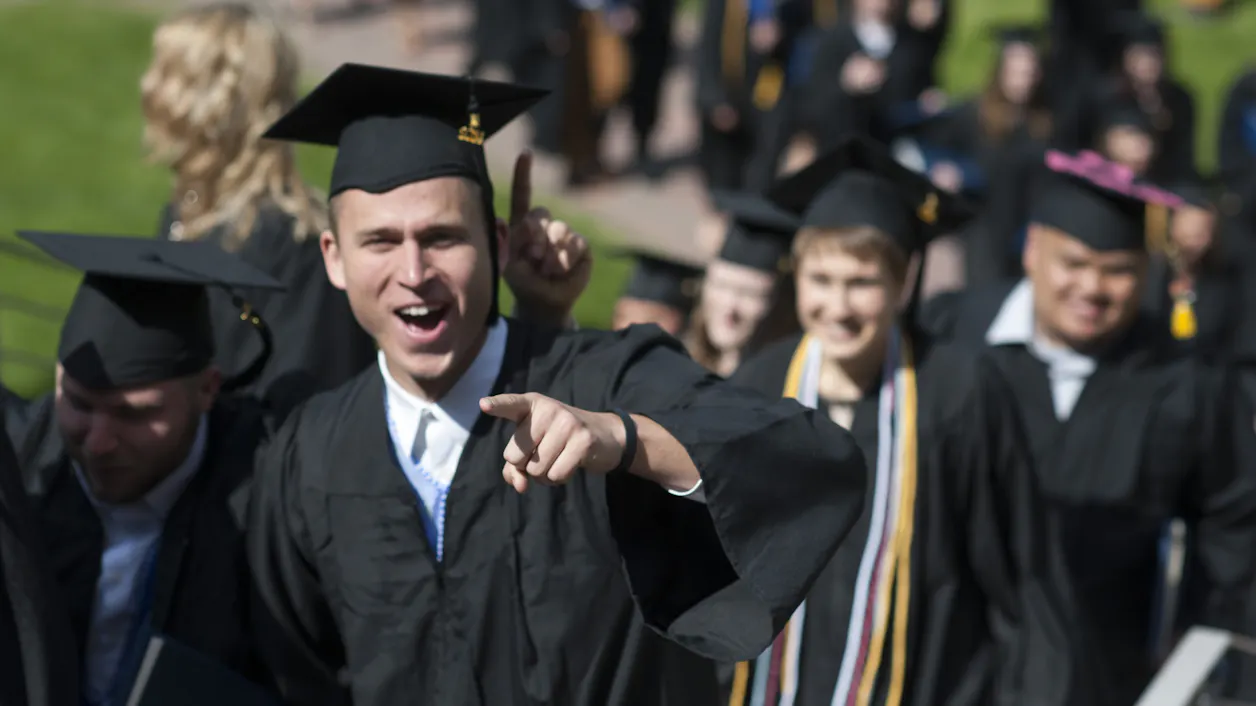 A student celebrates graduation day at Bethel.